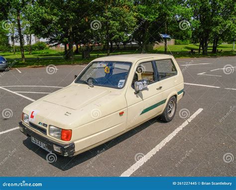 Vintage Reliant Robin Faded Yellow Three Wheeled Car Editorial Image