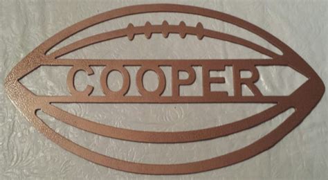 Decorate your home walls with different metal kitech storage, clocks & wall shleves at myntra cod discounts. Football Metal Wall Art metal sports decor football sign | Etsy | Football wall art, Metal wall ...