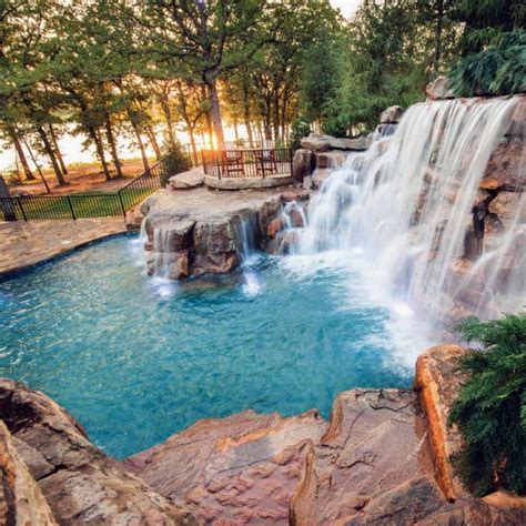 We feature an extensive collection of styles and sizes of pool rock waterfall formations with or without the uniquely designed need some creative pool waterfalls ideas? Top 60 Best Pool Waterfall Ideas - Cascading Water ...