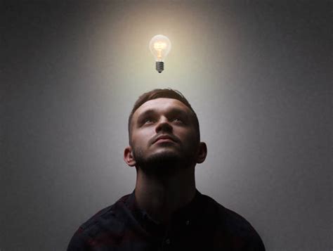 10 Man Looking Up With Idea Light Bulb Above Head Stock Photos
