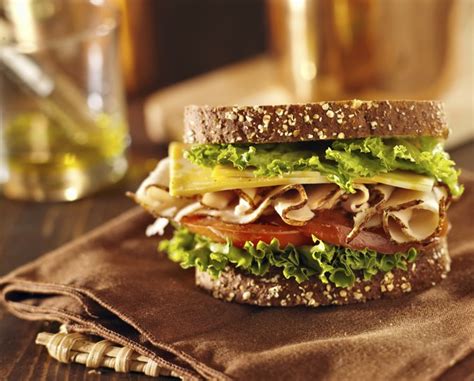 In 1 oz of turkey breast meat there are 29 calories in 100 g of turkey breast meat there are 104 calories now roasted turkey breast meat without the skin. How Many Calories are in a Turkey Sandwich? | LIVESTRONG.COM