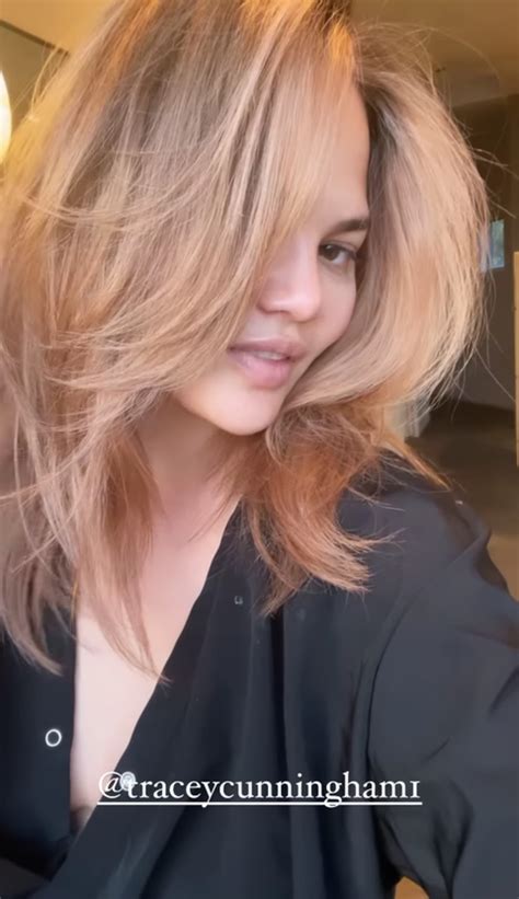 chrissy teigen dyes brunette hair to a cool toned blonde shade