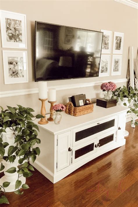 How To Decorate Around A Tv Using A Gallery Wall Tv Stand Decor