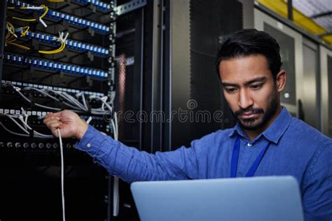 Engineer Laptop Server Room And Cable Connection For Software Update