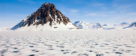 The tundra is a vast region of cold, mostly treeless lands extending along the entire margin of the arctic ocean. Tundra - Climate