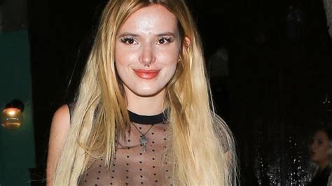 Bella Thorne Shows Off Her Nipple Piercing In A Sheer Top Photos