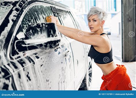 Young Woman Washes A Car In A Car Wash Stock Image Image Of