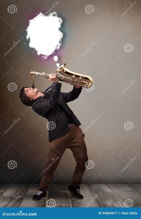 Young Man Playing On Saxophone With Copy Space In White Cloud Stock