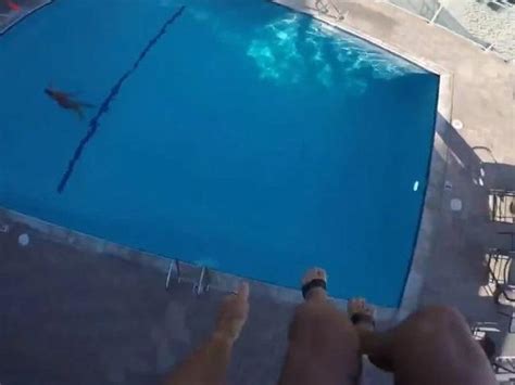 Man Jumps From Hotel Roof Into Swimming Pool Booth Video Is Heart