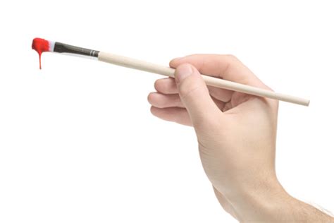Hand Holding A Paint Brush Stock Photo Download Image Now Istock