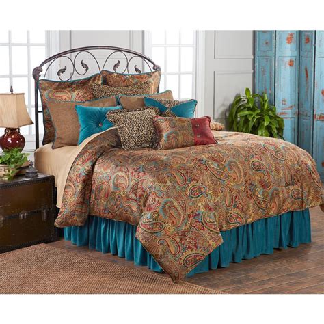 The set includes a bedspread and two shams, and it's available in full/queen or king/california king sizes. San Angelo Comforter Set with Teal Bedskirt - Full