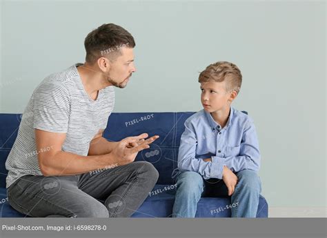 Angry Father Scolding His Little Son At Home Stock Photography