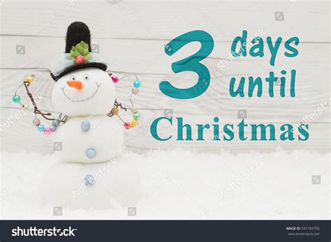 Christmas Countdown Message Some Snow And A Snowman On Weathered Wood