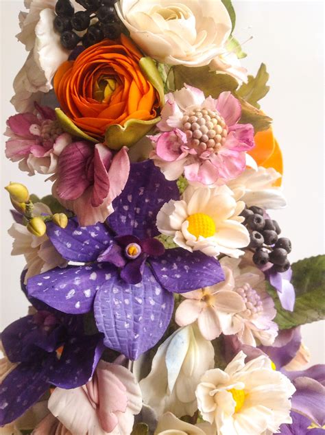 A Selection Of Sugar Flowers For A Whimsical Wedding Cake