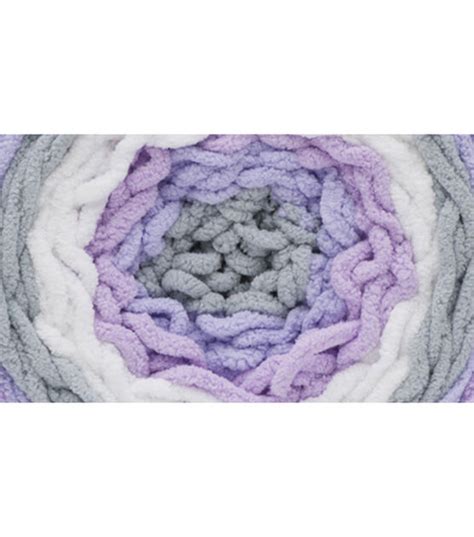 Pull the back loop (loop on the left) over the front loop. Bernat Baby Blanket Stripes Yarn | JOANN