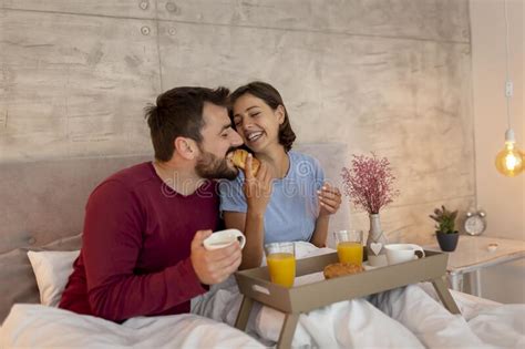 Couple Eating Breakfast And Drinking Coffee In Bed Stock Image Image