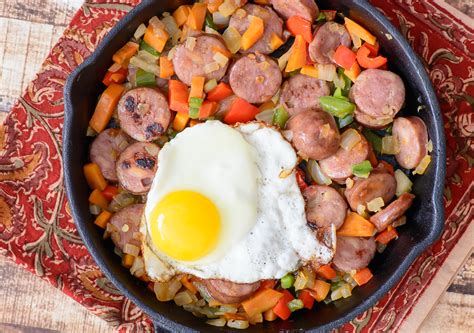 This recipe uses a classic combo of chicken and andouille sausage. One Skillet Sausage and Sweet Potato Hash - Almost Supermom