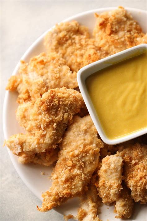 Parmesan chicken strips with marinara dipping sauce. Parmesan Sesame Chicken Strips and Honey Mustard Dipping ...