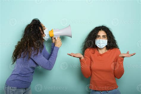 Woman Screams With Loudspeaker To A Friend But It Is Difficult To