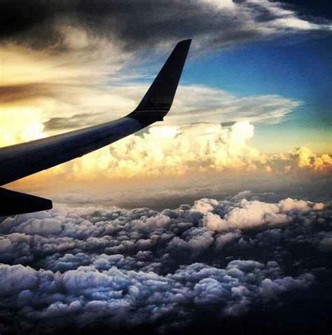 Flying Above A Storm Clouds Airplane View Photo