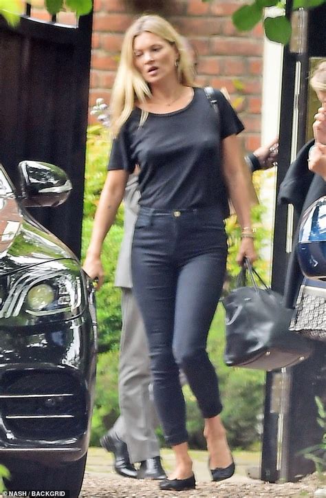 Kate Moss 45 Opts For Low Key Chic As She Goes Braless In A Black Tee