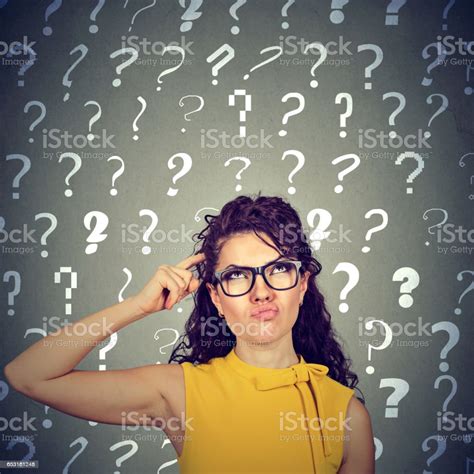 Confused Thinking Young Woman Stock Photo - Download Image Now - iStock