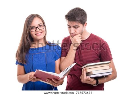 Young Student Couple Studying Together Reading Stock Photo 713573674