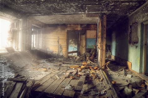Interior View Of The Destroyed Room In An Abandoned House Stock Photo