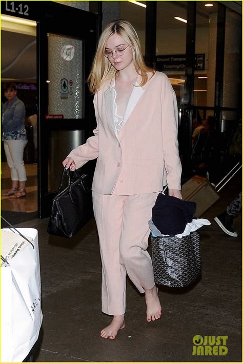 Full Sized Photo Of Elle Fanning Goes Barefoot At Lax