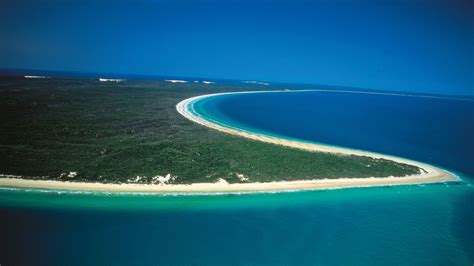 Fraser island is a large sand island 122 km (76 miles) long (the largest sand island in the world) situated off the southern coast of the australian state of queensland, some 300 km (200 miles) north of the state capital brisbane. Fraser Island Brisbane - Gets Ready