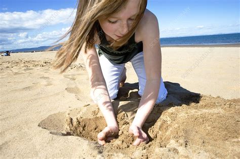 Girl Playing With Sand Stock Image P Science Photo Library