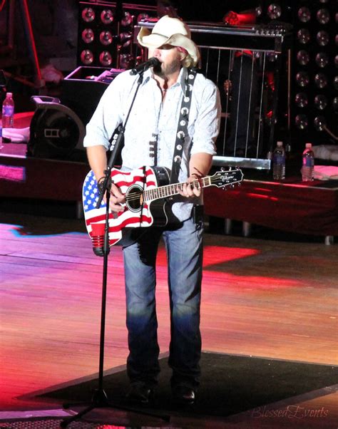 Check out their web site for the story at takamine.com. flag guitar Toby Keith | Tammara Leonard Schleicher | Flickr