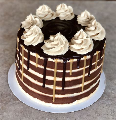 Striped Peanut Butter And Chocolate Drip Cake