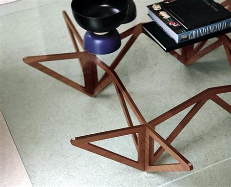 Japanese art of folding paper inspired us to create this unique piece of furniture. Origami coffee table by Porada. - Design Is This