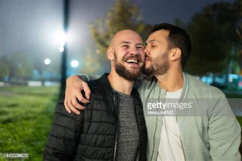 gay men kiss night photos and premium high res pictures getty images