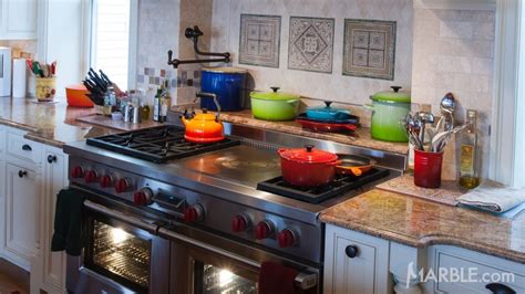 O madura gold wiemy zatem. Madura Gold Granite Countertops with Oak Cabinets | Marble.com