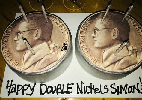 Two Commemorative Coins With The Words Happy Double Nibbles Simon On Them