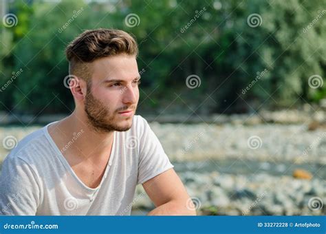 Portrait Of Handsome Young Man Outdoors In Nature Stock Photo Image