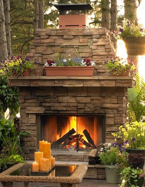 Modern fireplaces vary in heat efficiency, depending on the design. Beautiful outdoor stone fireplace | Outdoor Spaces | Pinterest