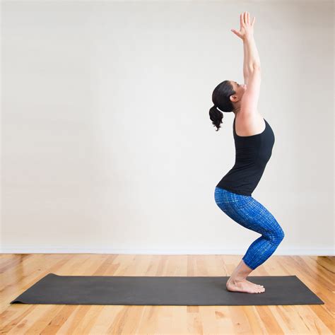 How To Do Fierce Pose In Yoga Also Called Chair Pose Popsugar Fitness