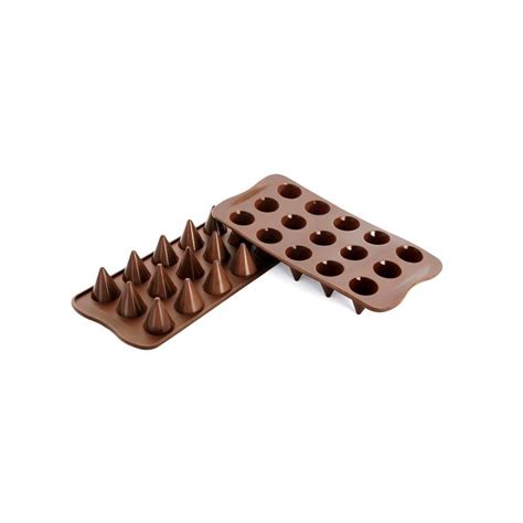 This greasing can increase the fat content in your recipe. Silicone Chocolate Mold "Cone"