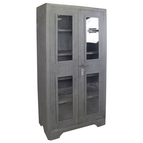 Maybe you would like to learn more about one of these? Industrial Two Door Glass Front Cabinet at 1stdibs