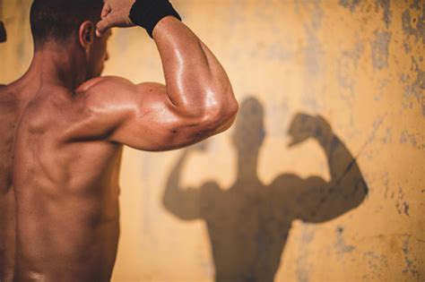 Shadow Of A Muscle Man Stock Photo Download Image Now Istock