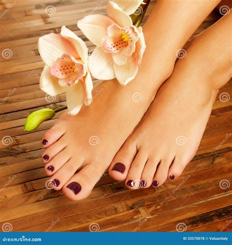 Female Feet At Spa Salon On Pedicure Procedure Stock Photo Image