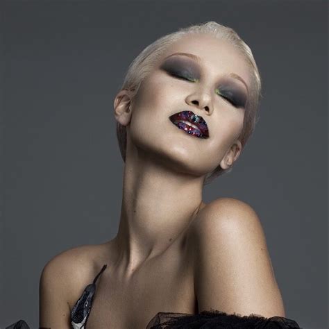 Her color typically fluctuates between jet black and chocolate brown, a strong contrast to her sister gigi's lighter. Bella Hadid Goes Blonde For Paper Magazine's Winter 2016 ...