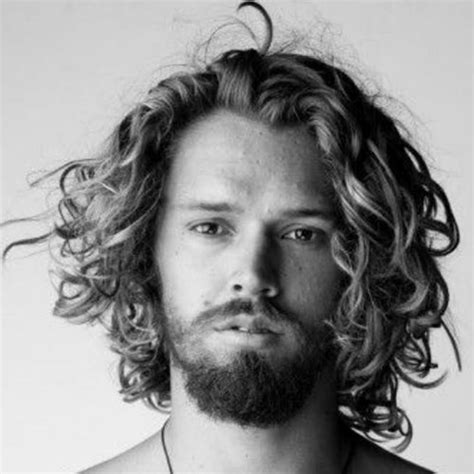 Texturizing spray is used to increase the natural curls of the hair in men. 200 Playful and Cool Curly Hairstyles for Men and Boys