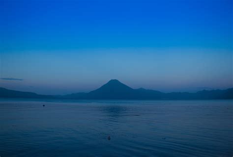 Landscape Photography Of Volcano Under Calm Sky Hd Wallpaper