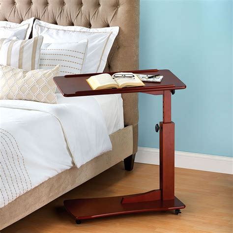 Odkryj cozy sofa table on wheels room stockowych obrazów w hd i miliony innych beztantiemowych zdjęć stockowych, ilustracji i wektorów w kolekcji shutterstock. The Adjustable Height Side Table - Hammacher Schlemmer