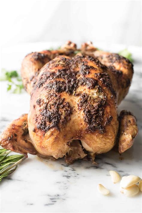 While the chicken is baking, mix together the parmesan cheese, garlic, oil, and fresh chopped parsley. Juiciest Garlic Rosemary Roasted Chicken | Hunger|Thirst|Play