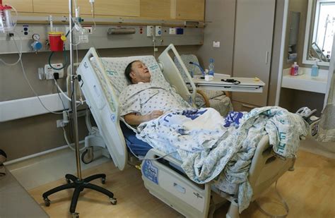 Man Lying In A Hospital Bed At Hadassah University Medical Center In